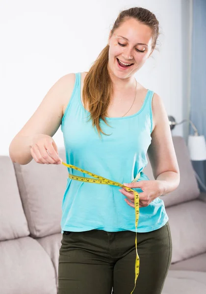 Young Woman Feeling Happy Measuring Her Waist Home — Stock Photo, Image