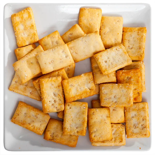 Tasty Thin Crackers Sesame Seeds Plate Isolated White Background — Stock Photo, Image