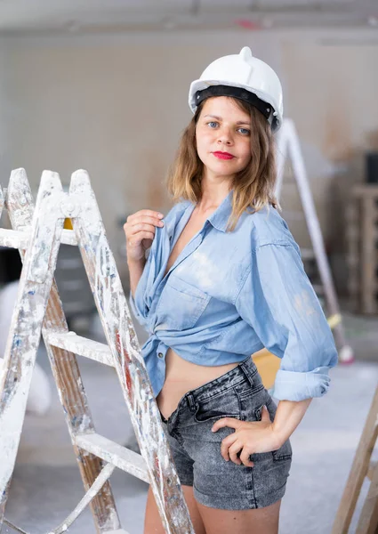 Seductive Woman Hardhat Denim Shirt Posing Next Stepladder Room Being — Stockfoto
