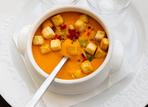 Traditional Spanish dish Gazpacho, made from tomato puree, is served with croutons