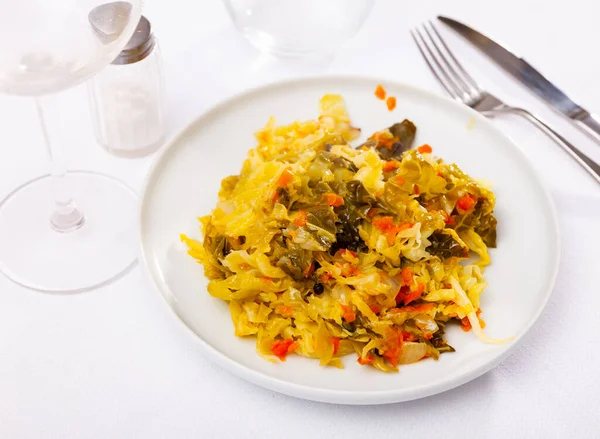 Tasty and easy braised white cabbage with carrot and onion - healthful side dish for meat meals.