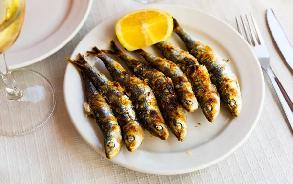 Malaga Cuisine Grilled Sardines Served Lemon White Plate Wooden Table — Stock Photo, Image