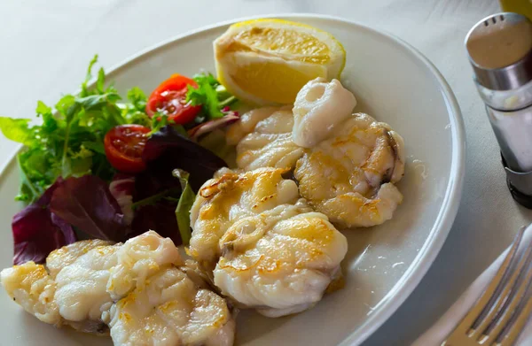 Baked Angler Fish Served Lemon Slice Salad Leaves Cherry Tomato — Stock Photo, Image