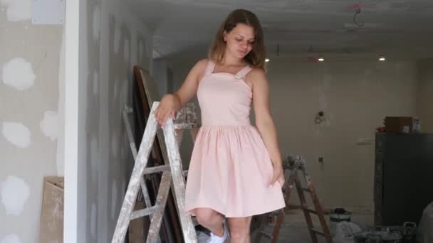 Attractive Young Woman Wearing Dress Posing Construction Site Standing Stepladder — Stockvideo