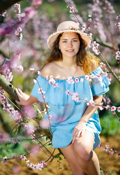 Lovely Female Blue Dress Straw Hat Walking Blooming Park Springtime — Stock Photo, Image