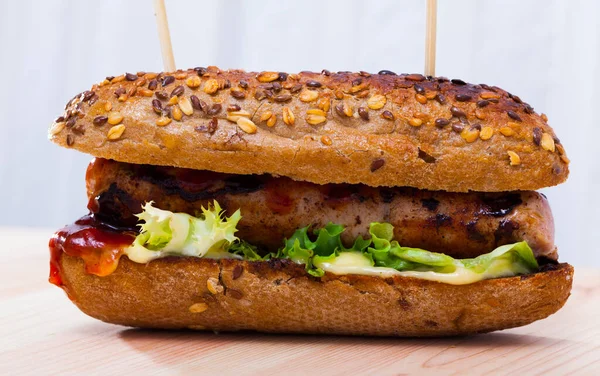 Delicious Hot Dog Rustic Style Grain Bun Roasted Sausage Lettuce — Stock Photo, Image