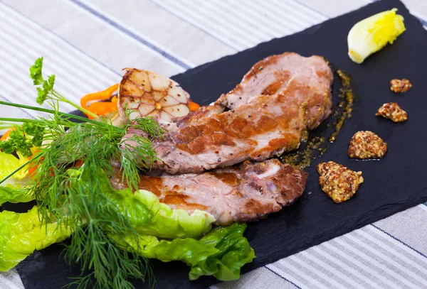 Juicy Fried Pork Chop Golden Crust Served Greens Mustard Slate — Stock Photo, Image