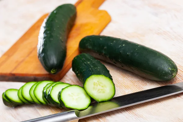 Close Cut Fresh Green Cucumbers Wooden Background Nobody — Stock Photo, Image
