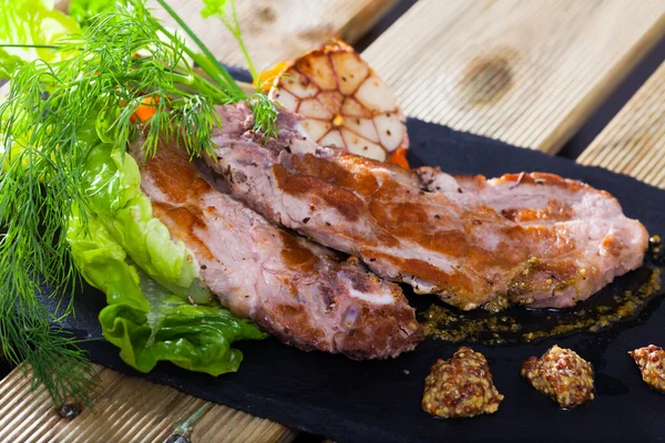 Tasty Juicy Roasted Pork Chop Served Greens Mustard Slate — Stock Photo, Image