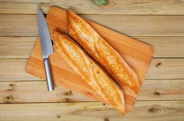 Closeup of crunchy french baked baguettes, bakery products, nobody