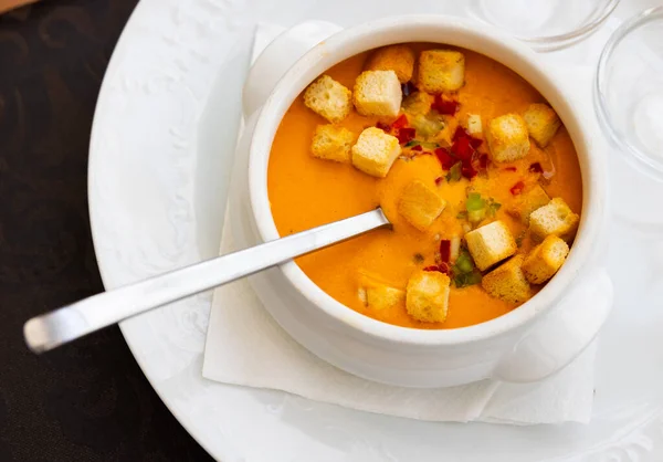 Traditional Spanish dish is cold soup Gaspacho, made from raw vegetables crushed in puree and served with crackers