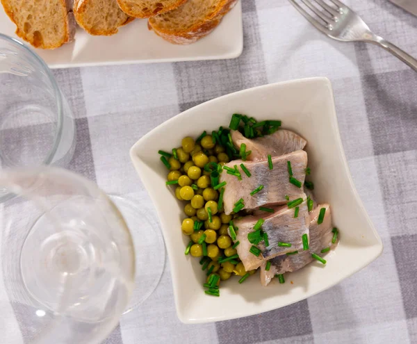 Pieces Salted Herring Served Plate Green Peas Poured Scallion — Stock Photo, Image