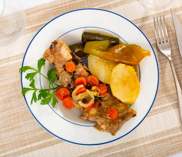 Delicious Dish Stewed Pork Ribs Potatoes Vegetables Decorated Fresh Sprig — Stock Photo, Image