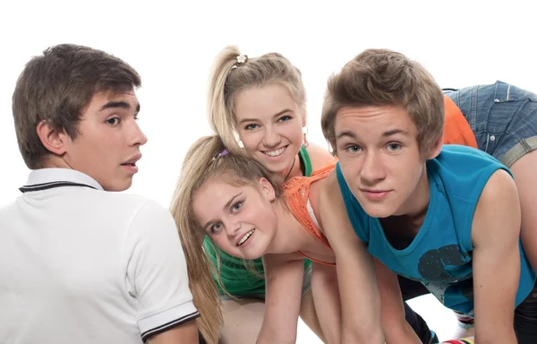 Teenagers cheerfully play — Stock Photo, Image