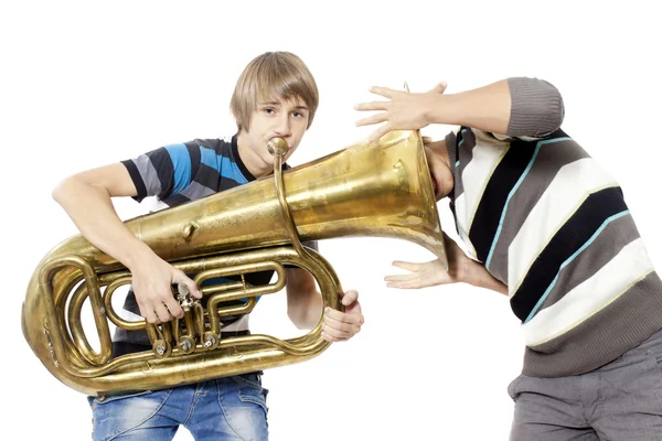 Fun boys enjoy with a trumpet — Stock Photo, Image