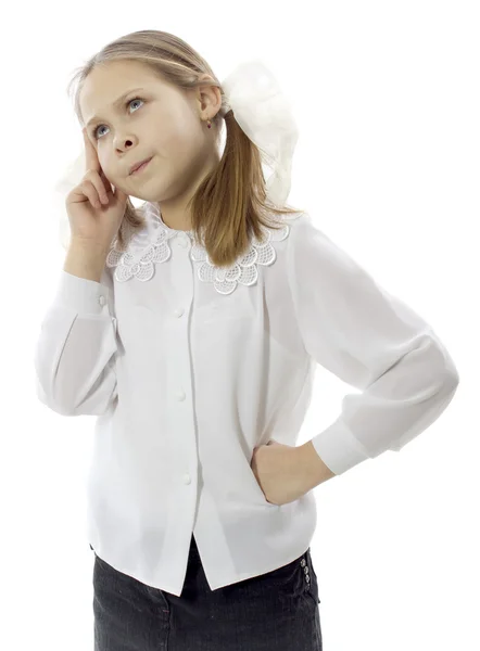 Studio portrait of adorable small school girl with pigtails. — Stock Photo, Image