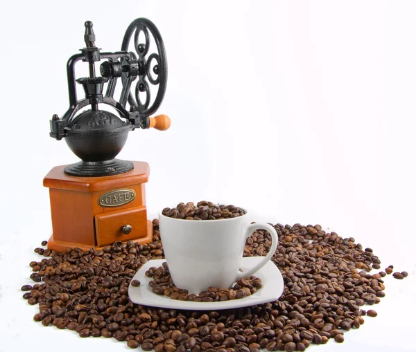 Viejo molino de mano con grano de café — Foto de Stock