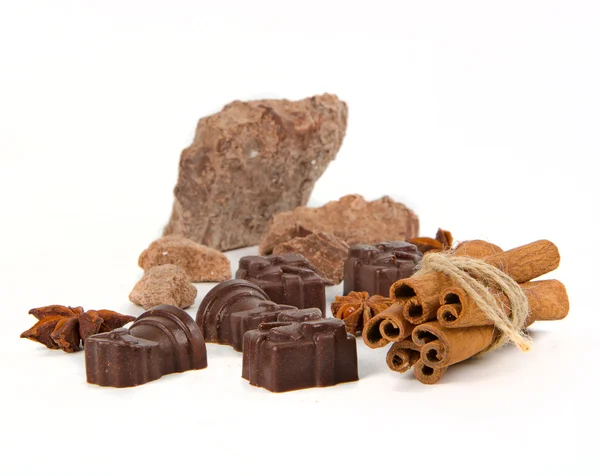 Chocolate and candy with spice — Stock Photo, Image