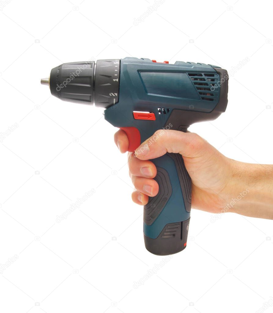 Electric screwdriver in hand isolated on white background. Element of design. Boulding tool and equipment.