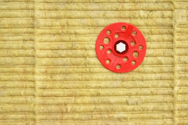 Green Mineral Wool Attached Wall Dowels Red Plastic Caps Construction — Stock Photo, Image