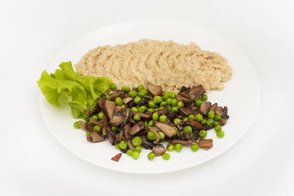 Pilze und grüne Erbsen — Stockfoto