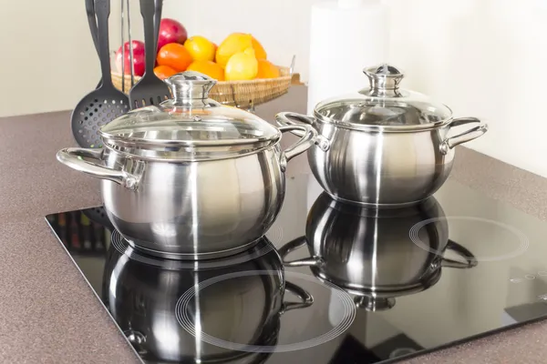 Ceramic hob with pans — Stock Photo, Image