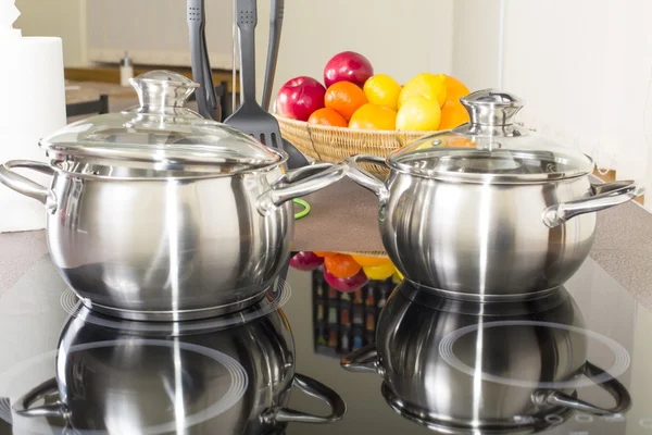 Ceramic hob with pans — Stock Photo, Image