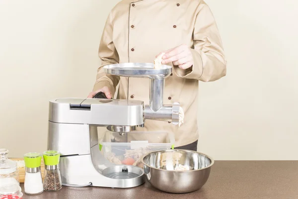 Chef makes mincemeat — Stock Photo, Image