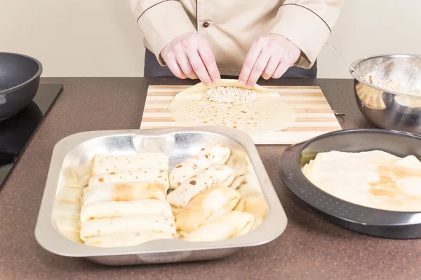 Cook prepares empanadas — Stock Photo, Image