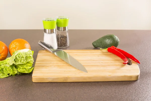 Products on kitchen table — Stock Photo, Image