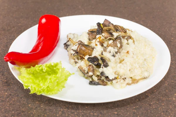 Millet porridge with mushrooms — Stock Photo, Image