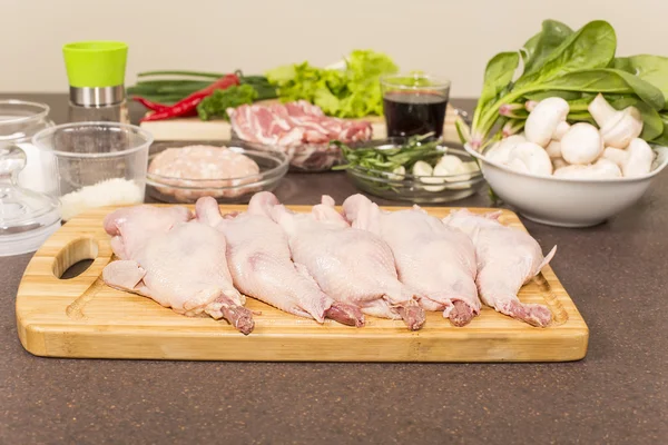Quails a whole bird and products for stuffing — Stock Photo, Image