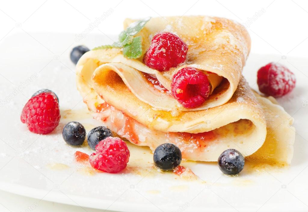 Crepes with berries and mint
