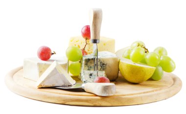 Cheese and grapes on wooden platter