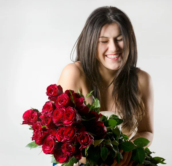 Hermosa mujer con flor — Foto de Stock