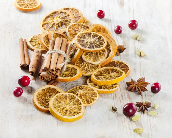 Spices and dried oranges — Stock Photo, Image