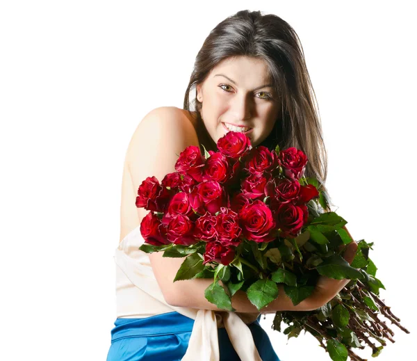 Hermosa mujer con rosas rojas — Foto de Stock