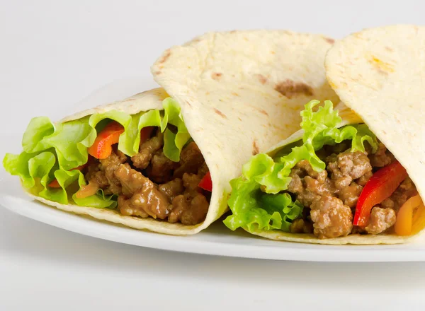 Tortilla wraps with meat and vegetables — Stock Photo, Image