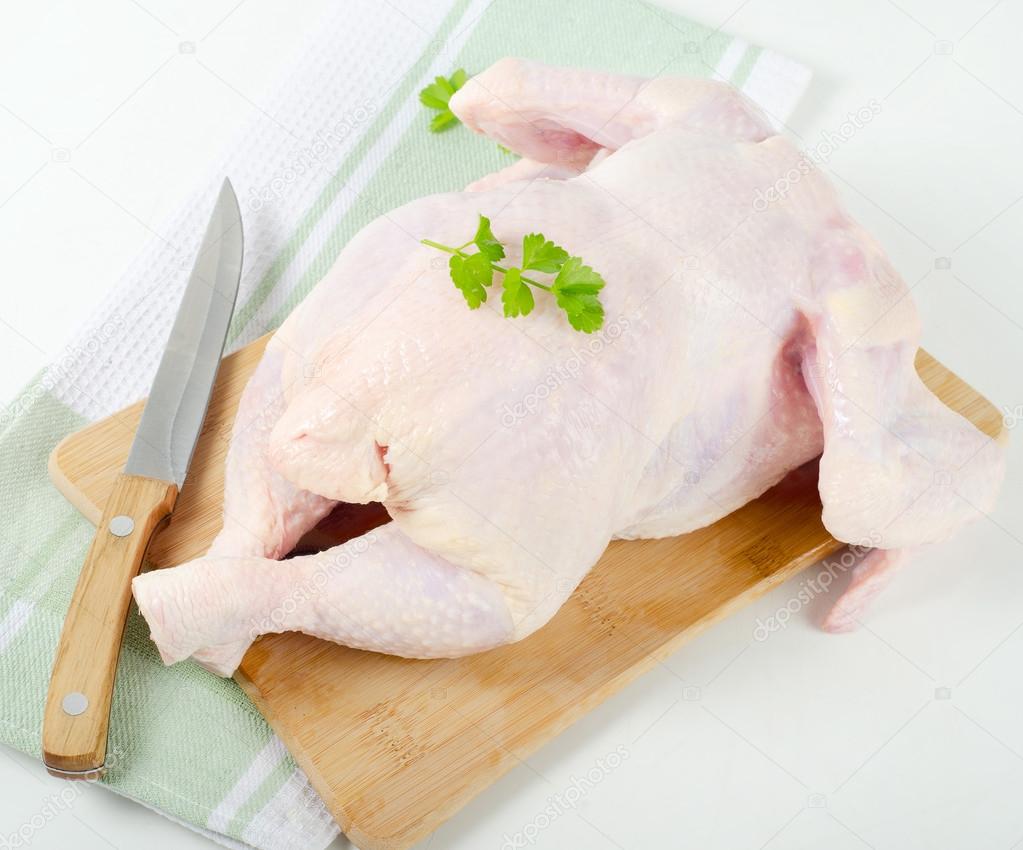 Whole raw chicken — Stock Photo © bit245 25330193