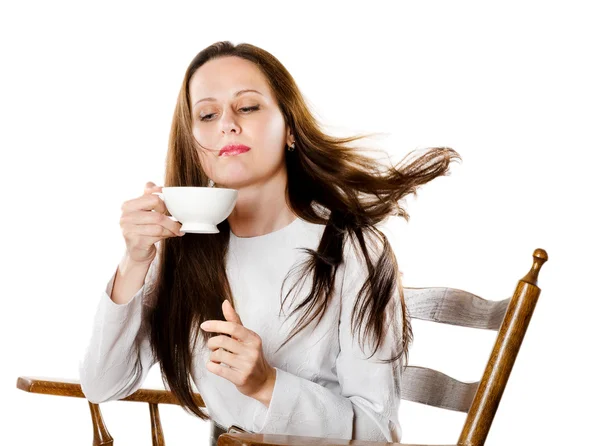 Young woman drinking coffee — Stock Photo, Image