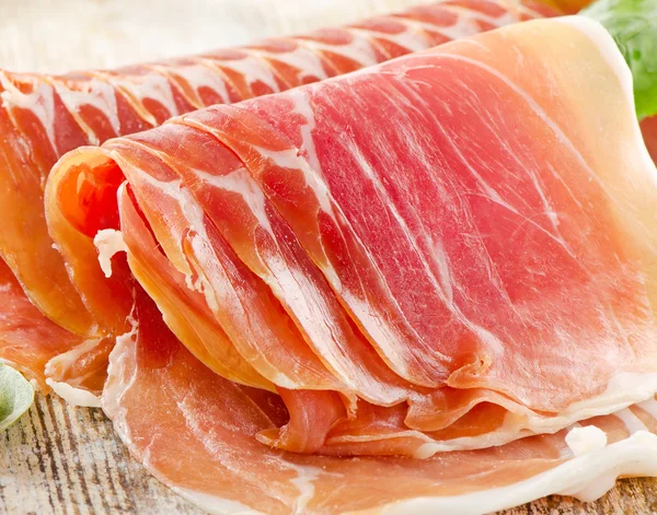 Slices of cured ham — Stock Photo, Image