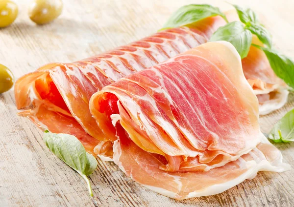 Slices of cured ham — Stock Photo, Image