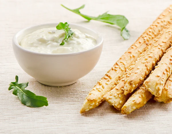 Bread sticks with sauce — Stock Photo, Image