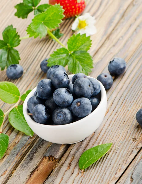 Blueberries on wooden table. — Stock Photo, Image