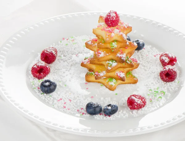 Sweet christmas tree with berries — Stock Photo, Image