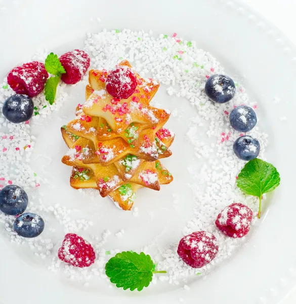 Christmas dessert - tree of chookies with berries and mint