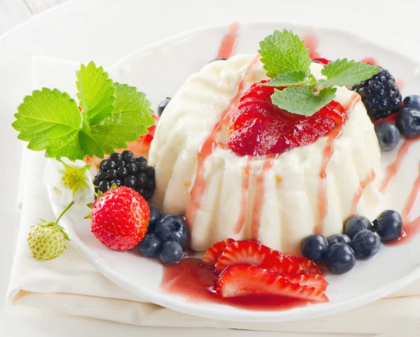 Delicious dessert with fresh berries and mint — Stock Photo, Image