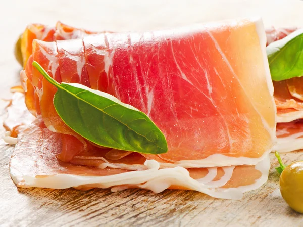 Slices of cured ham — Stock Photo, Image