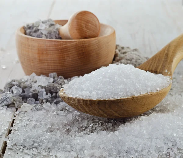 Salt in wooden spoon — Stock Photo, Image