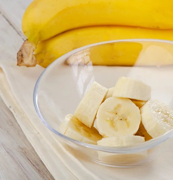 Fresh bananas on wooden background — Stock Photo, Image